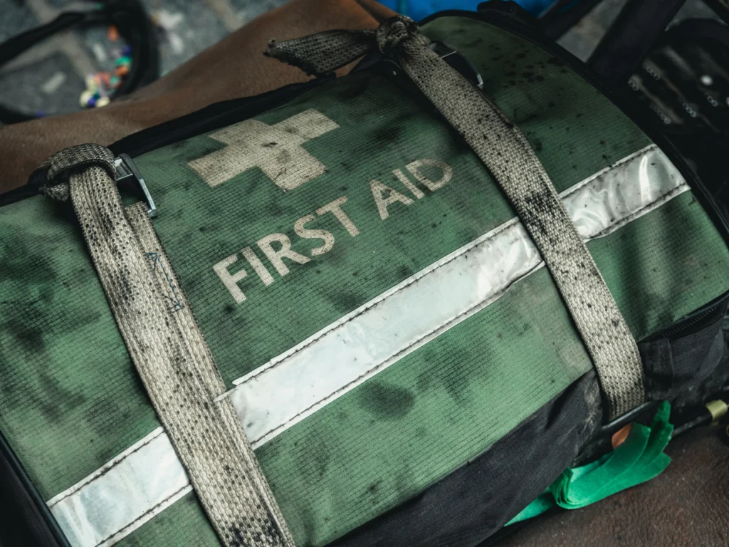 Emergency preparedness kit with water, food, and first aid supplies